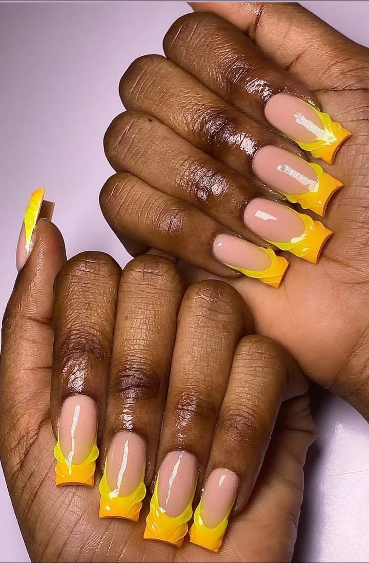 Long square acrylic set with bright yellow French tips